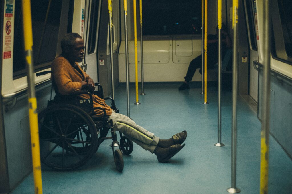 Man in wheelchair on a train