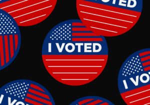 Image with red, white, and blue buttons and the words I VOTED